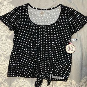 black shirt with white polka dots